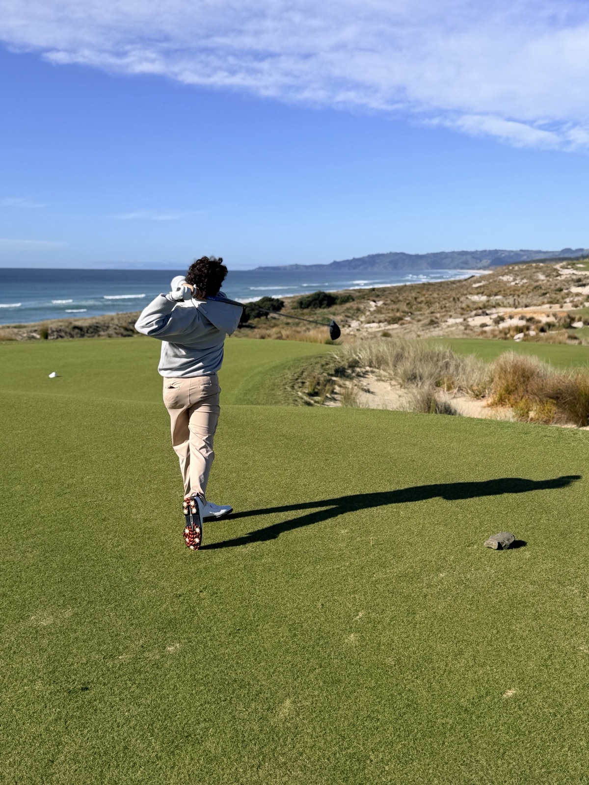 Zeke Varela hitting a tee shot